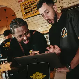 50+ staff across 2 venues, running on Square