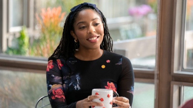 alt="Jessica Williams as Gaby sitting with a cup of coffee in Shrinking"