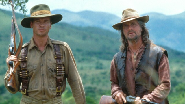 alt="Val Kilmer and Michael Douglas hunt deadly lions in The Ghost and the Darkness, 1996 adventure."