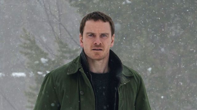 alt="Val Kilmer appears in The Snowman, a 2017 crime thriller starring Michael Fassbender as a detective."