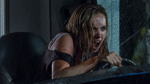 alt="Zoe Kazan screaming while driving in The Monster.jpg"